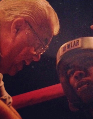 World-renowned trainer and manager Lou Duva cornering Zahir “King” Raheem at the 1996 Olympic Trials.